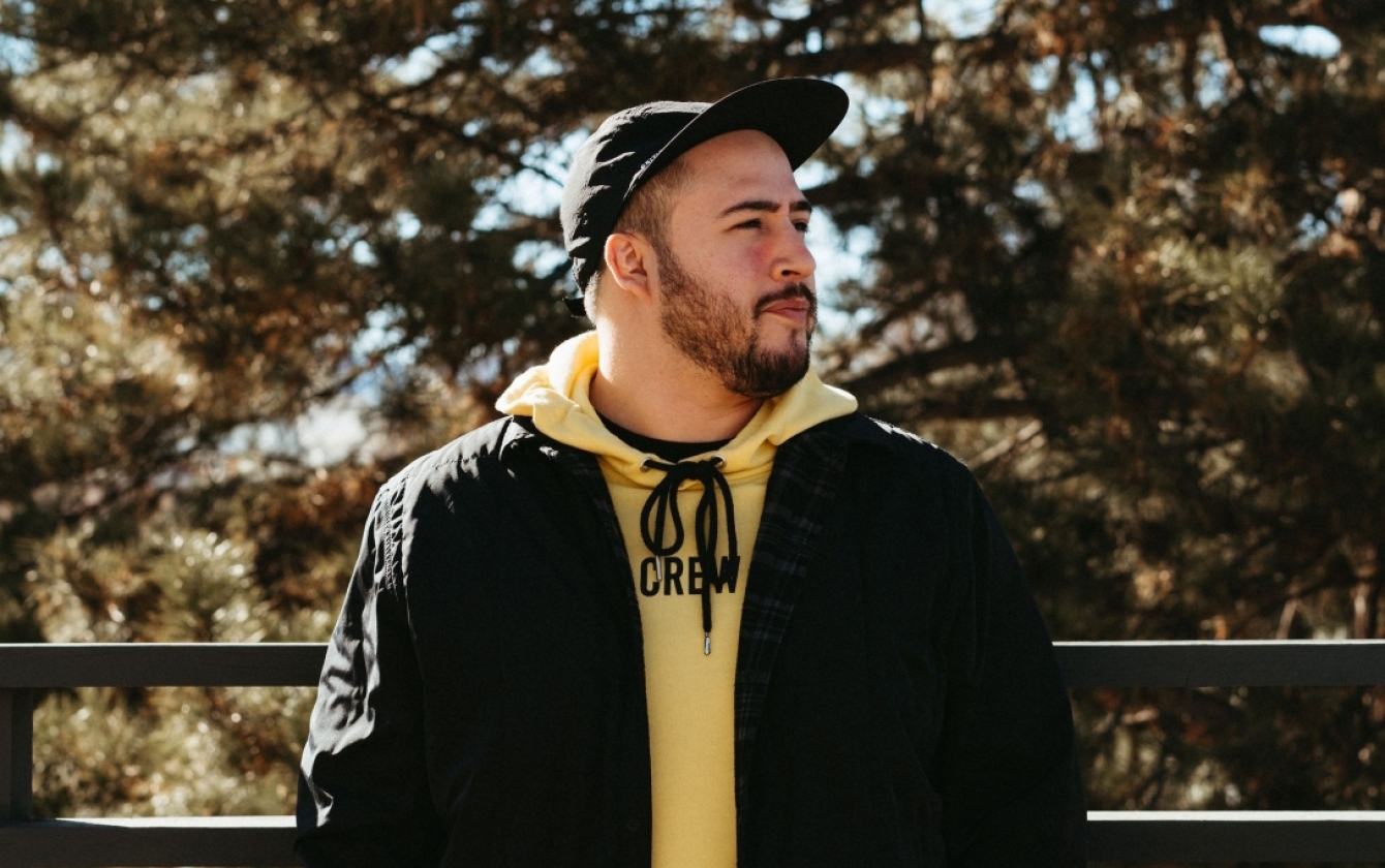 Artist photo of Diggy Codina in a black hat