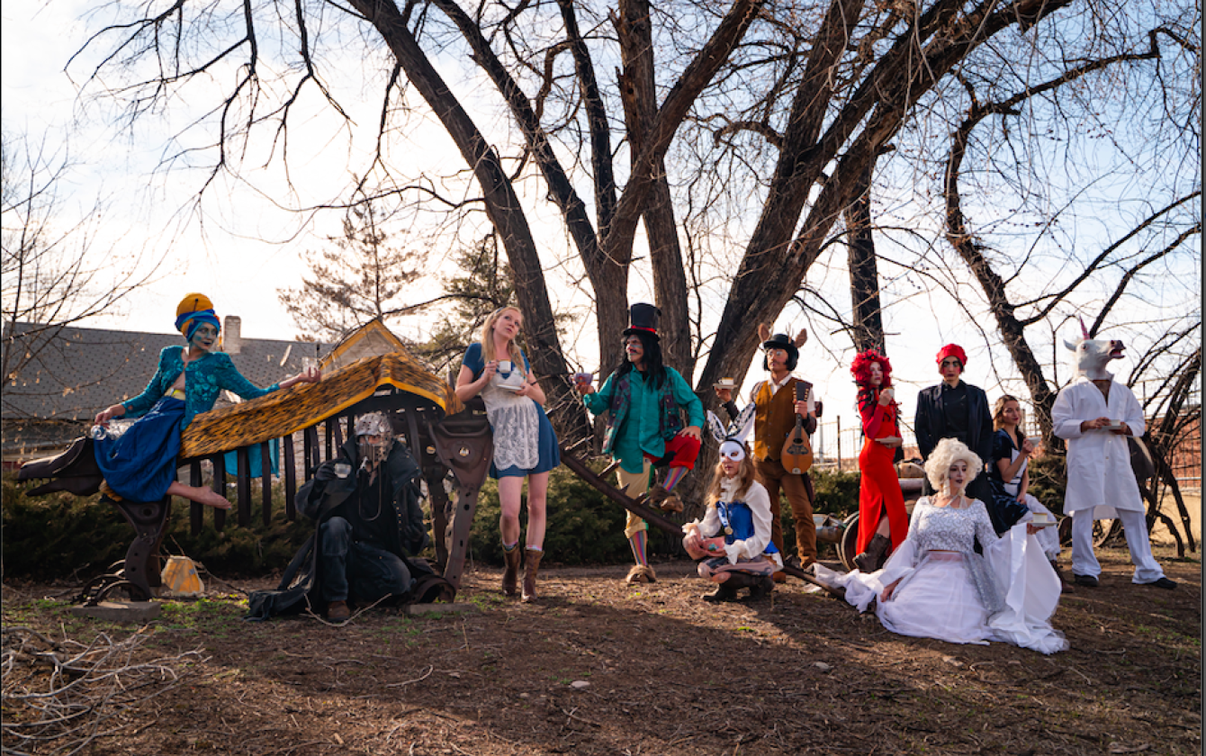 A photo of LuneAseas performing group, all ten people embodying characters.
