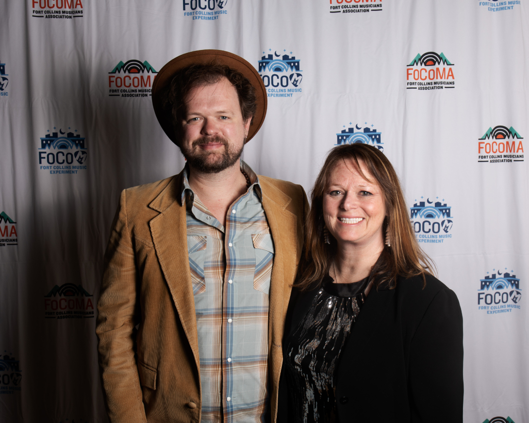 Guests at Peer Awards Photo by Marc Leverette standing in front of FoCoMA step-and-repeat 