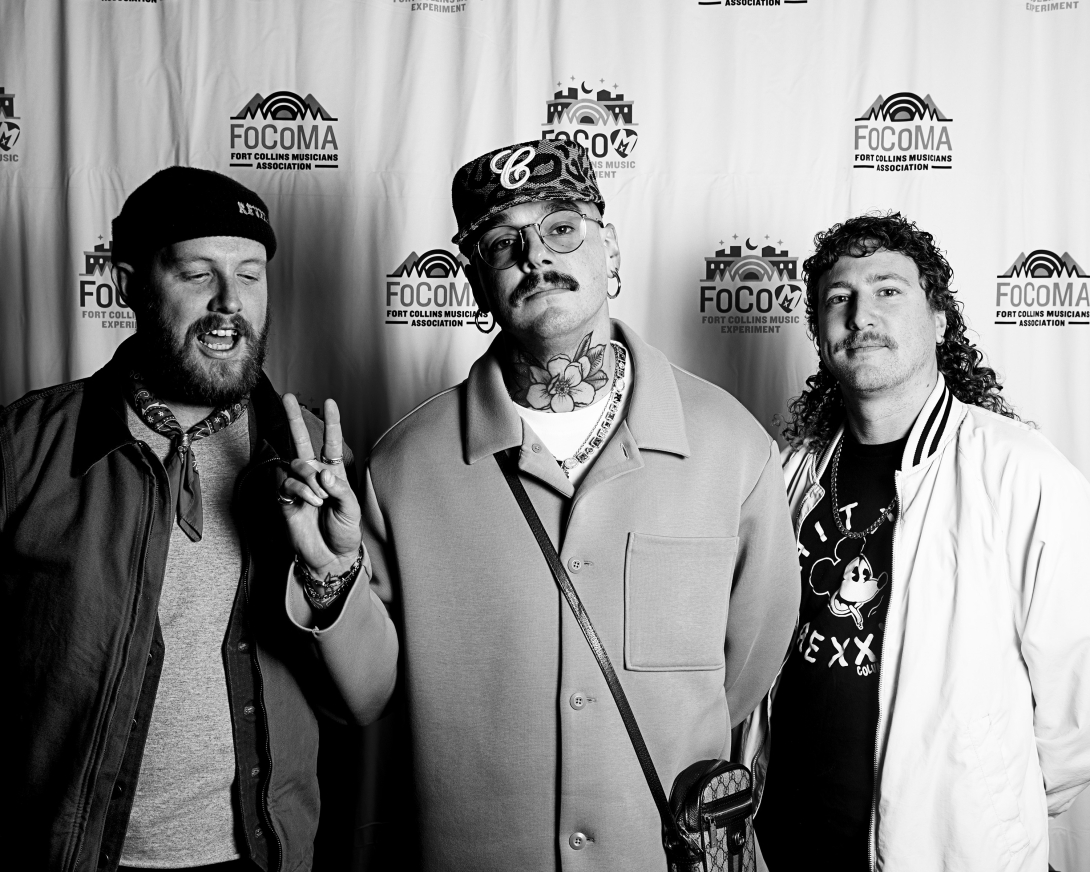 Guests at Peer Awards Photo by Marc Leverette standing in front of FoCoMA step-and-repeat 