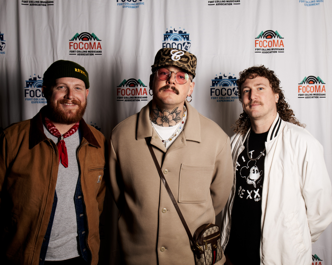 Guests at Peer Awards Photo by Marc Leverette standing in front of FoCoMA step-and-repeat 