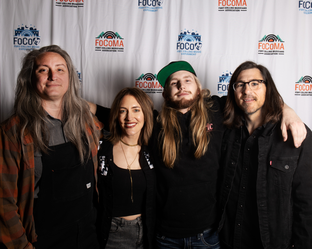 Guests at Peer Awards Photo by Marc Leverette standing in front of FoCoMA step-and-repeat 