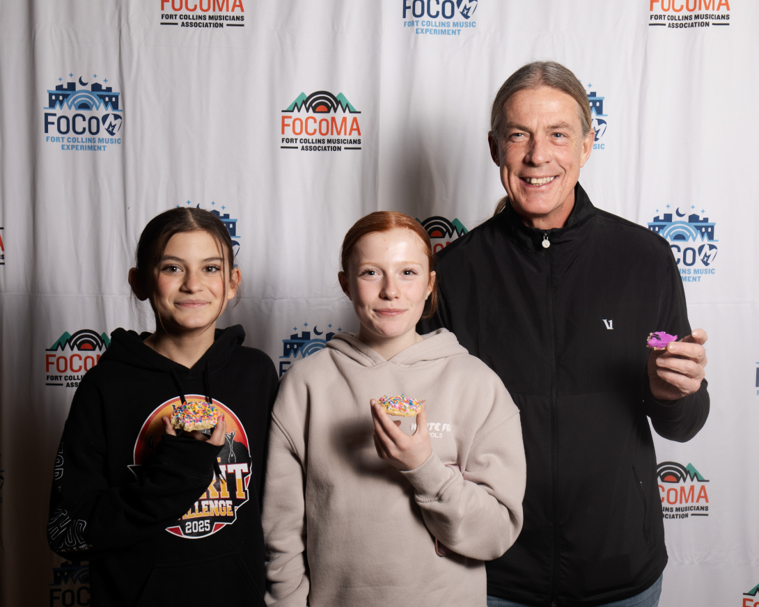 Guests at Peer Awards Photo by Marc Leverette standing in front of FoCoMA step-and-repeat 