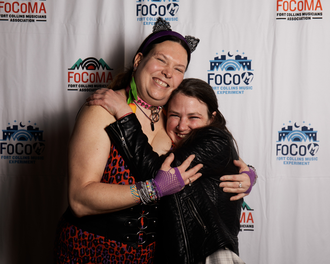 Guests at Peer Awards Photo by Marc Leverette standing in front of FoCoMA step-and-repeat 