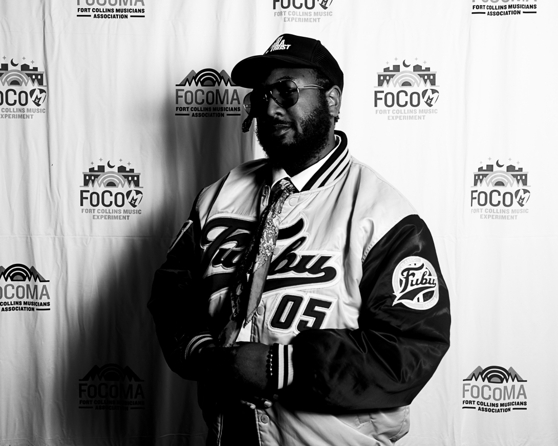 Guests at Peer Awards Photo by Marc Leverette standing in front of FoCoMA step-and-repeat 