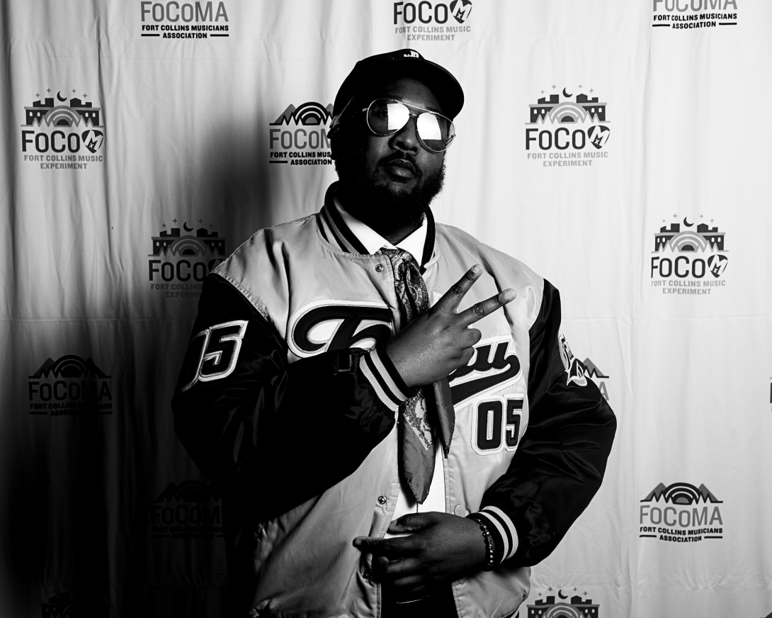 Guests at Peer Awards Photo by Marc Leverette standing in front of FoCoMA step-and-repeat 