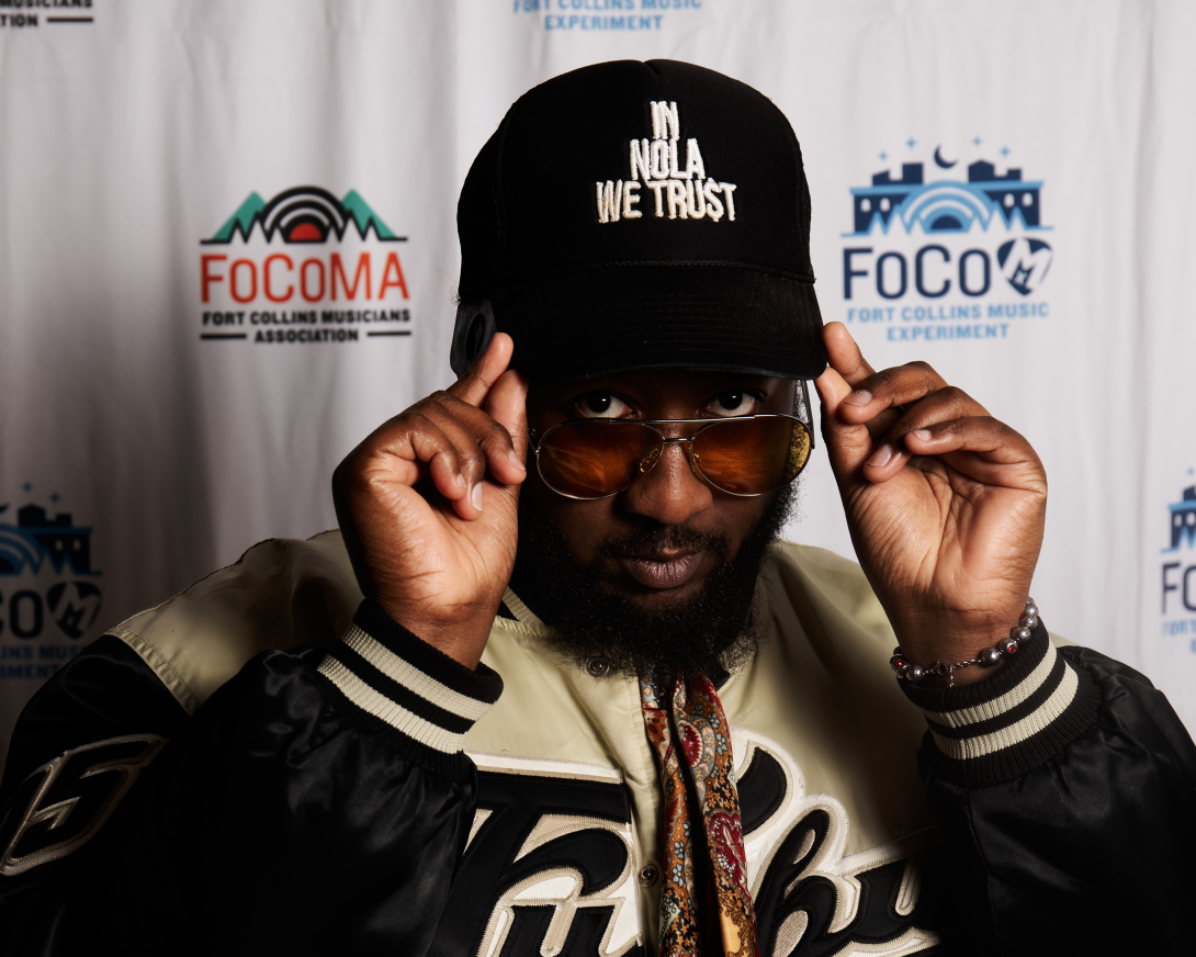 Guests at Peer Awards Photo by Marc Leverette standing in front of FoCoMA step-and-repeat 