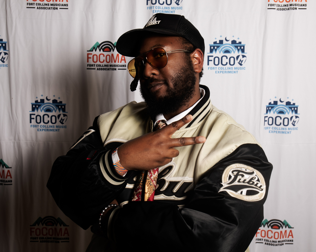 Guests at Peer Awards Photo by Marc Leverette standing in front of FoCoMA step-and-repeat 