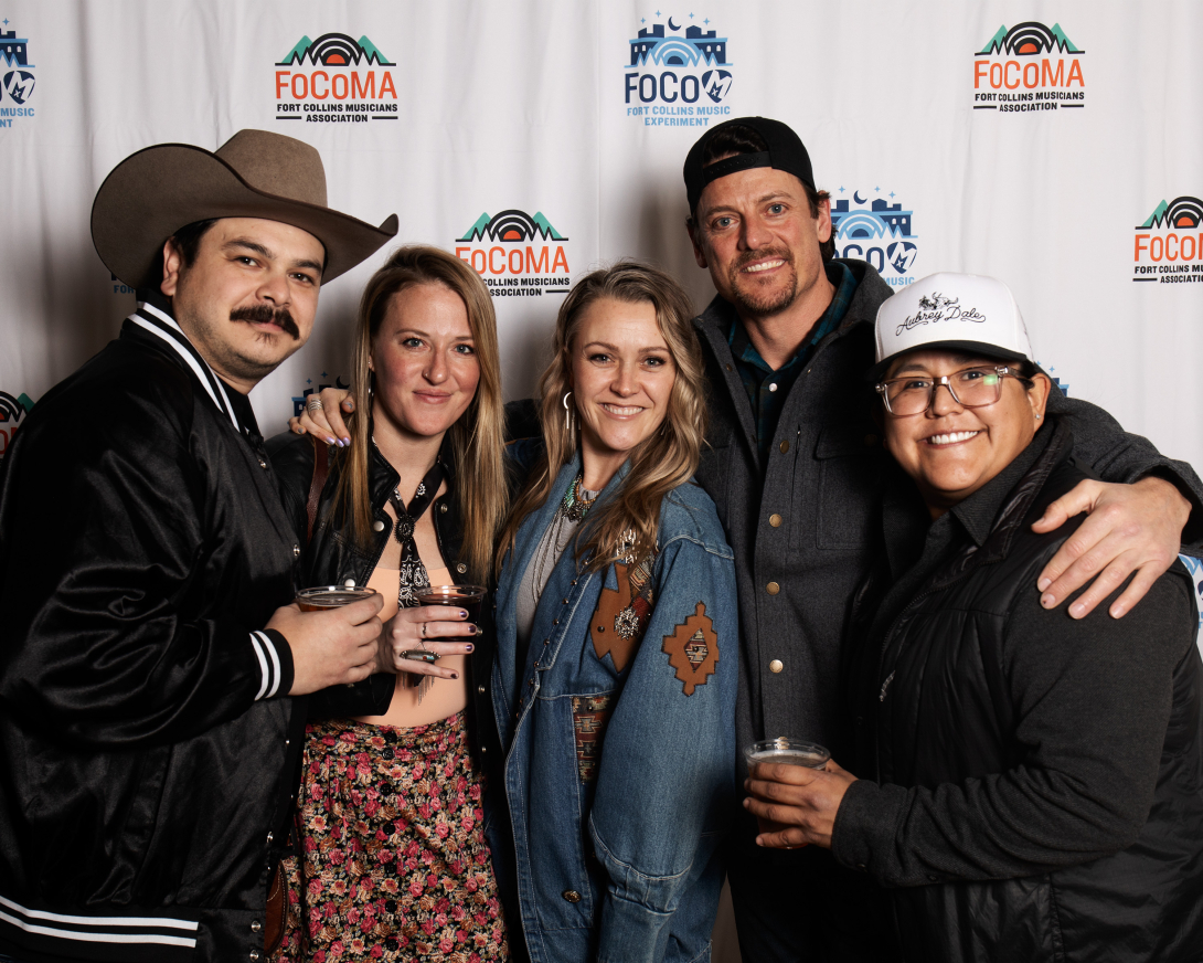 Guests at Peer Awards Photo by Marc Leverette standing in front of FoCoMA step-and-repeat 