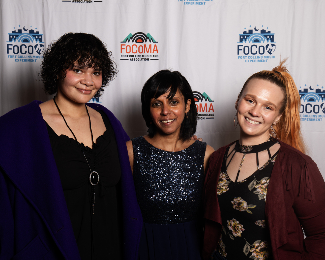 Guests at Peer Awards Photo by Marc Leverette standing in front of FoCoMA step-and-repeat 