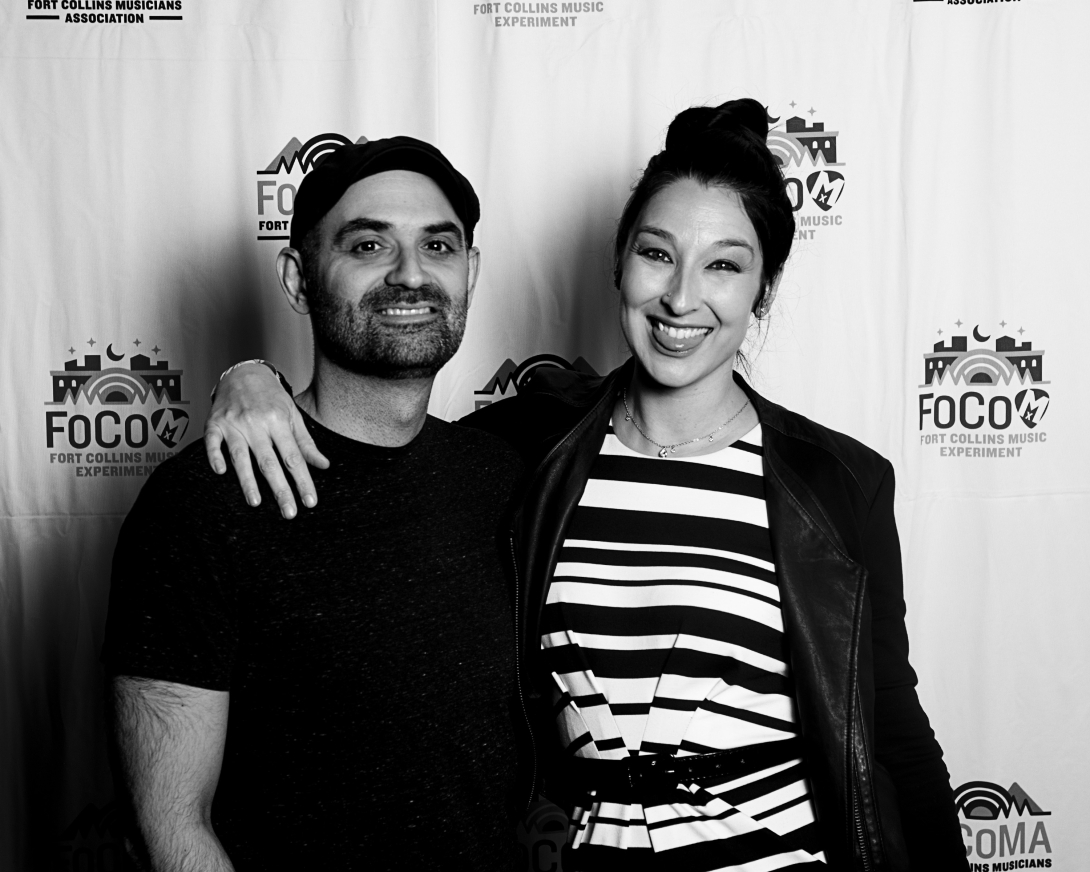 Guests at Peer Awards Photo by Marc Leverette standing in front of FoCoMA step-and-repeat 