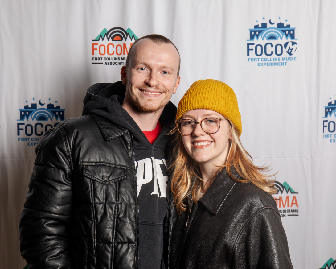 Guests at Peer Awards Photo by Marc Leverette standing in front of FoCoMA step-and-repeat 