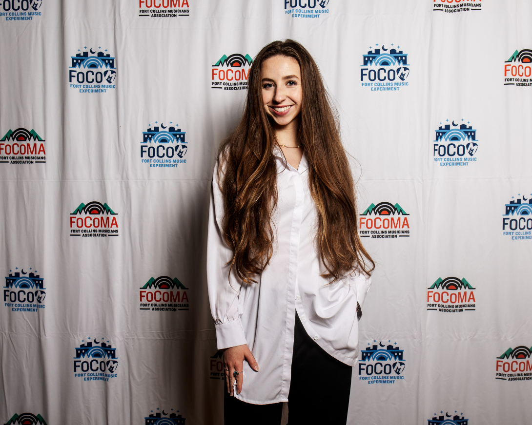 Guests at Peer Awards Photo by Marc Leverette standing in front of FoCoMA step-and-repeat 