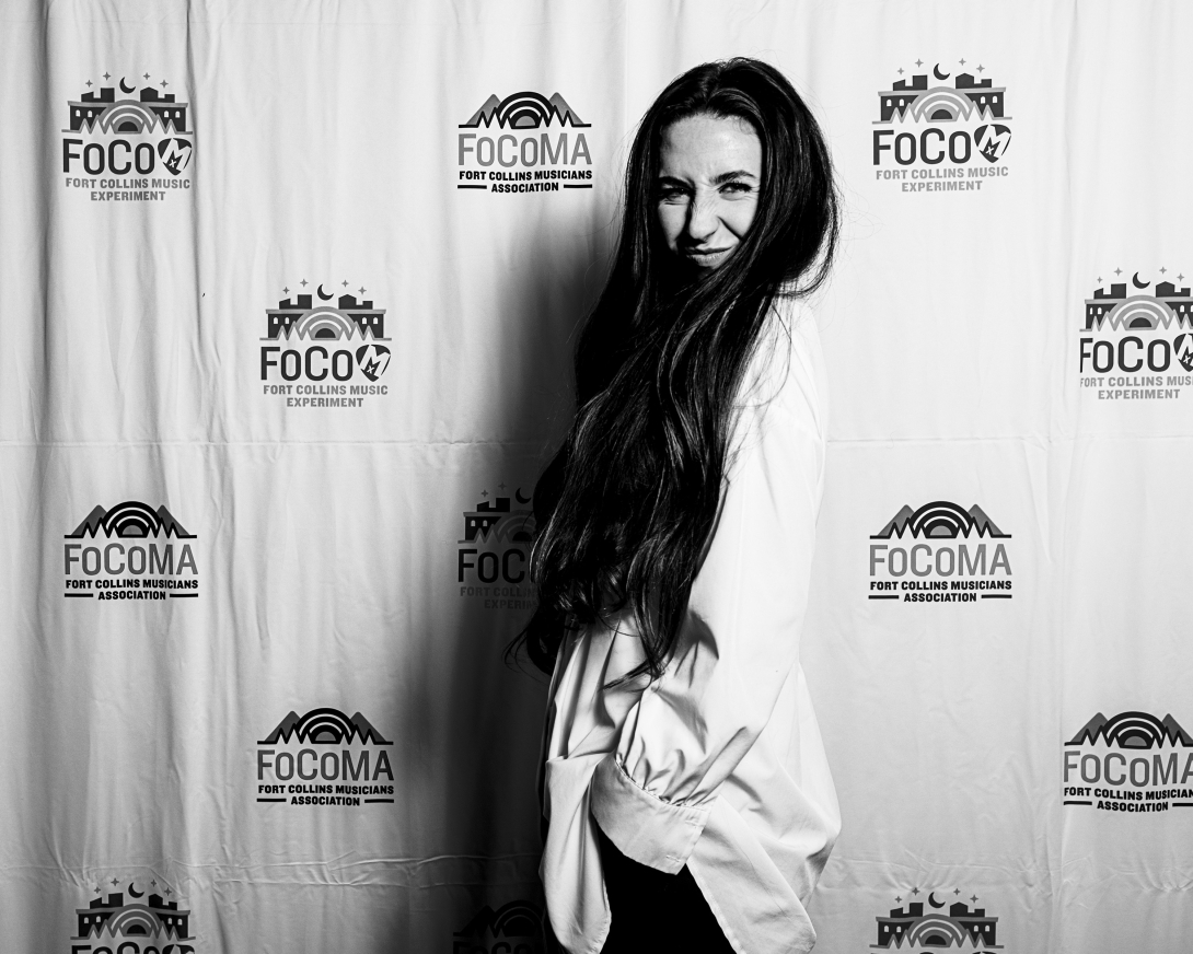 Guests at Peer Awards Photo by Marc Leverette standing in front of FoCoMA step-and-repeat 