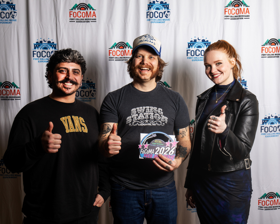Guests at Peer Awards Photo by Marc Leverette standing in front of FoCoMA step-and-repeat 