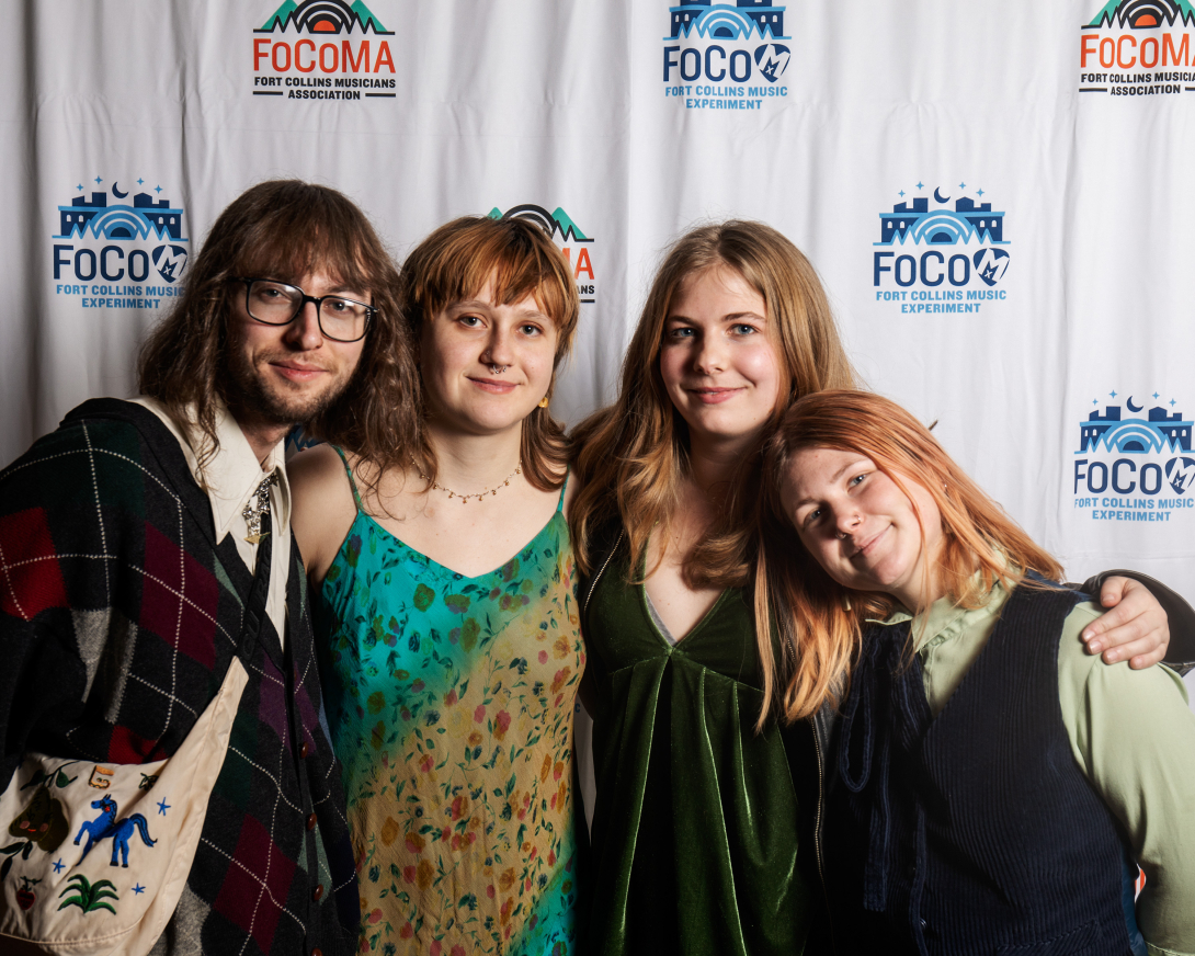 Guests at Peer Awards Photo by Marc Leverette standing in front of FoCoMA step-and-repeat 