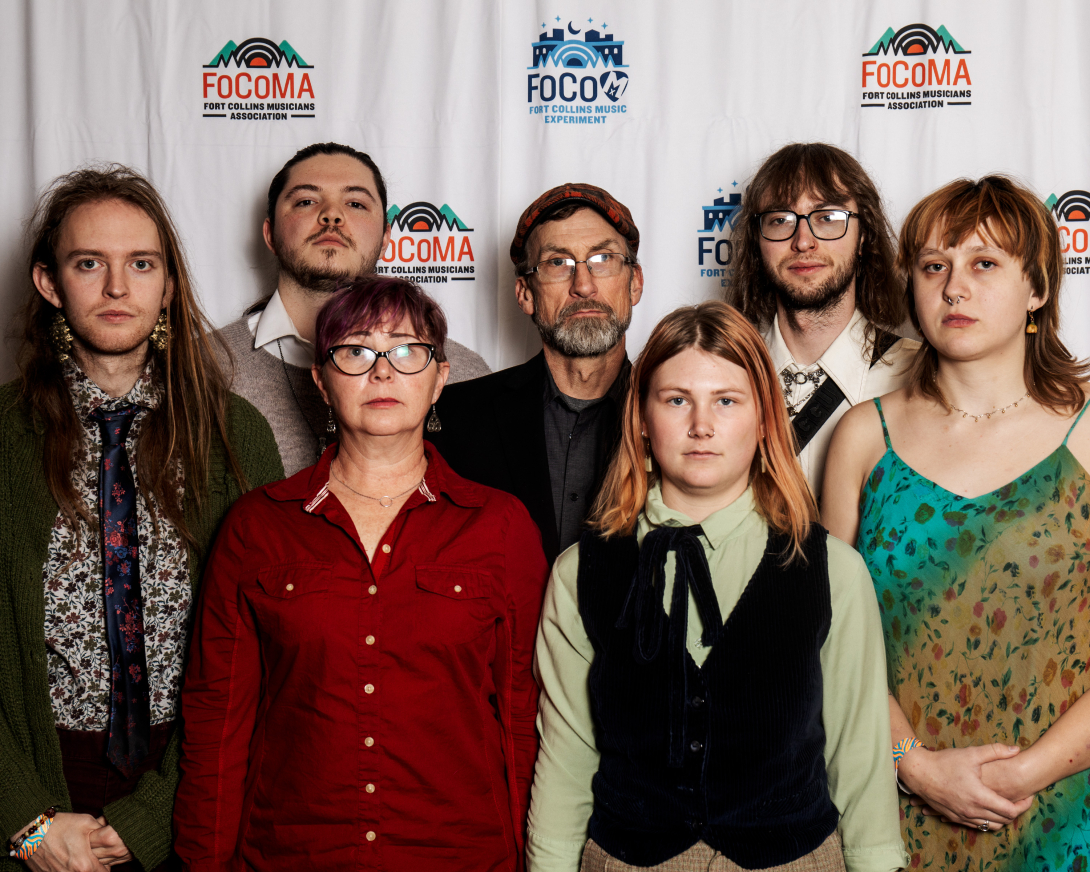 Guests at Peer Awards Photo by Marc Leverette standing in front of FoCoMA step-and-repeat 